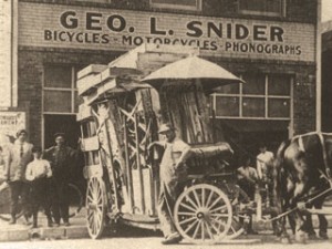 Receiving a shipment of bicycles, Geo. L. Snider - Bicycles-Motorcycles-Phonographs